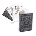 Playing cards with robot design and a matching box on a white background