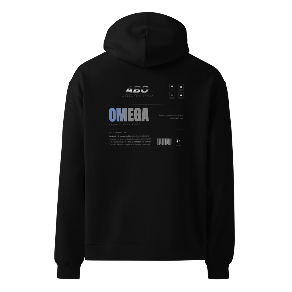 Standard Issue Comfort Top in black, rear view — ABO classification panel reading OMEGA, with fragility marker